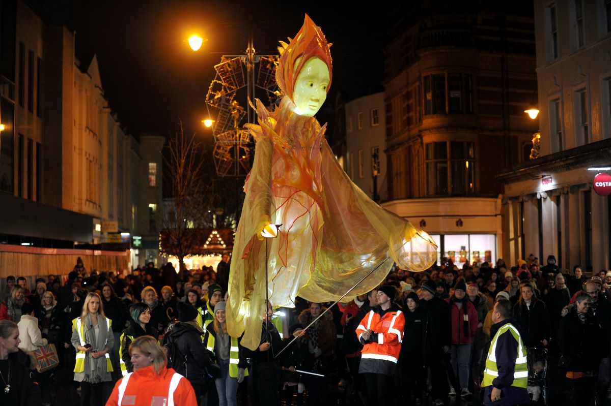 Giant puppet of Ghost of Christmas Past at Cheltenham Light Switch On